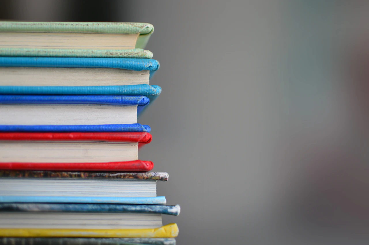 Apple and books on a school desk